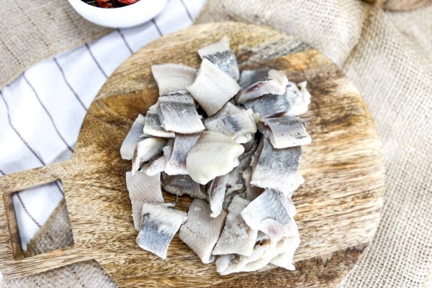 śledzie z suszonymi pomidorami - filety