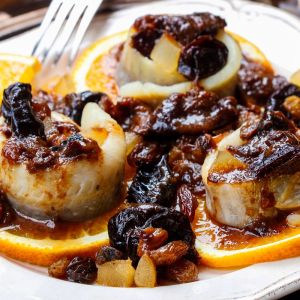 śledzie na pomarańczach