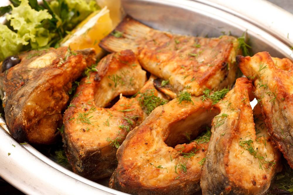 Karp zapiekany z pieczarkami